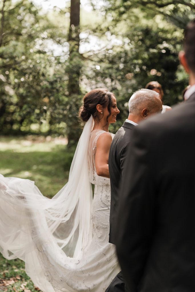 Walking down aisle: 
Winter Park, Florida

Bride, Father of Bride, Wedding Dress, Veil, Wedding dress train