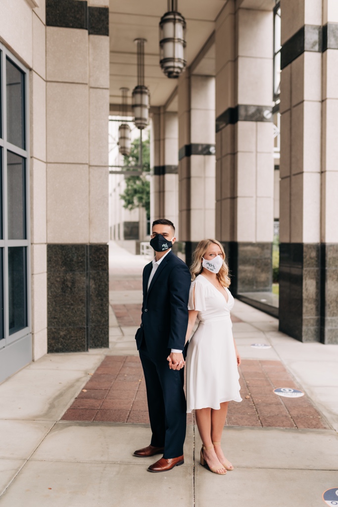 Couple wears mask during COVID-19 after marrying at county courthouse