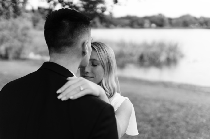 Black and white photo of Couple at Cherokee lake in Orlando after wedding 