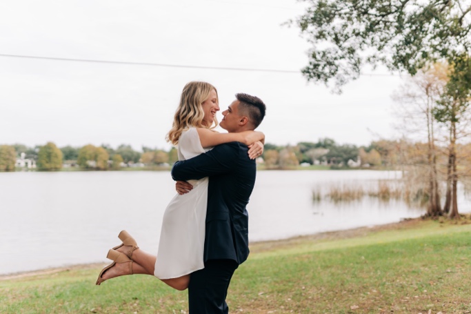 Couple at Cherokee lake in Orlando after wedding 