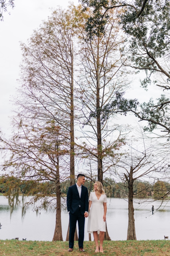 Couple at Cherokee lake in Orlando after wedding 